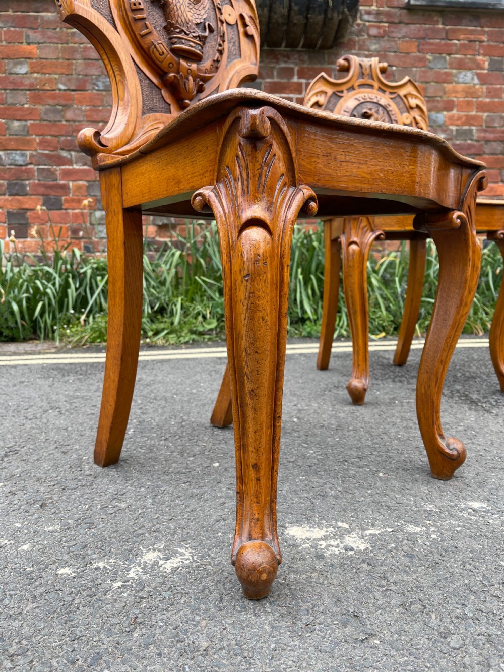 Pair of early Victorian oak hall chairs  View III