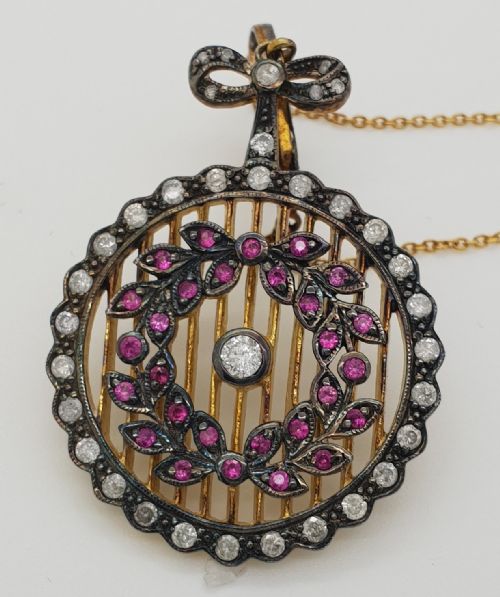 SILVER GILT RUBY AND DIAMOND EDWARDIAN PENDANT