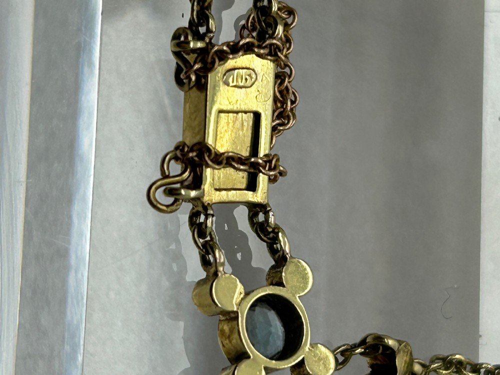 A late Victorian 15ct gold double trace chain bracelet set with round faceted aquamarines and split seed pearls. View III