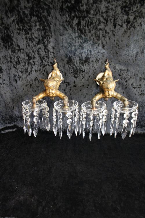 
Early 20th Century Pair of Cherub Wall Lights