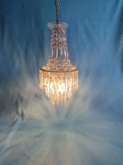 CHANDELIER WITH PRISMS TO THE TOP AND LUSTERS BENEATH - ADDITIONAL PHOTO 2