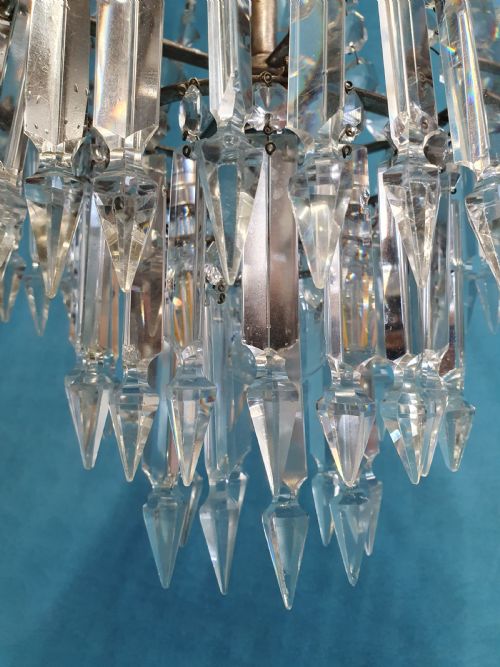 CHANDELIER WITH PRISMS TO THE TOP AND LUSTERS BENEATH - ADDITIONAL PHOTO 4