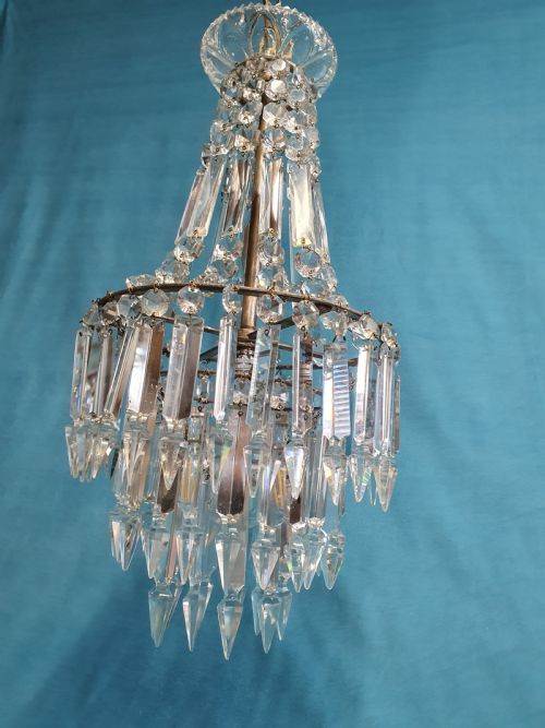 CHANDELIER WITH PRISMS TO THE TOP AND LUSTERS BENEATH - ADDITIONAL PHOTO 5