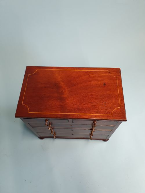 EARLY 19TH CENTURY MINIATURE 23 MAHOGANY CHEST OF DRAWERS DATED 1824 - ADDITIONAL PHOTO 1