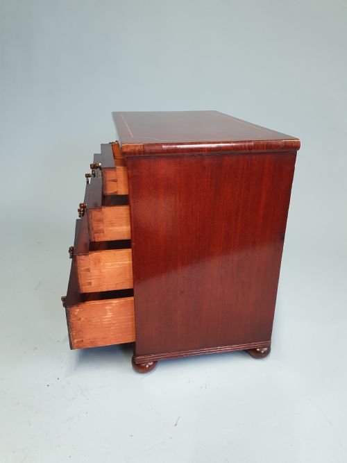 EARLY 19TH CENTURY MINIATURE 23 MAHOGANY CHEST OF DRAWERS DATED 1824 - ADDITIONAL PHOTO 3