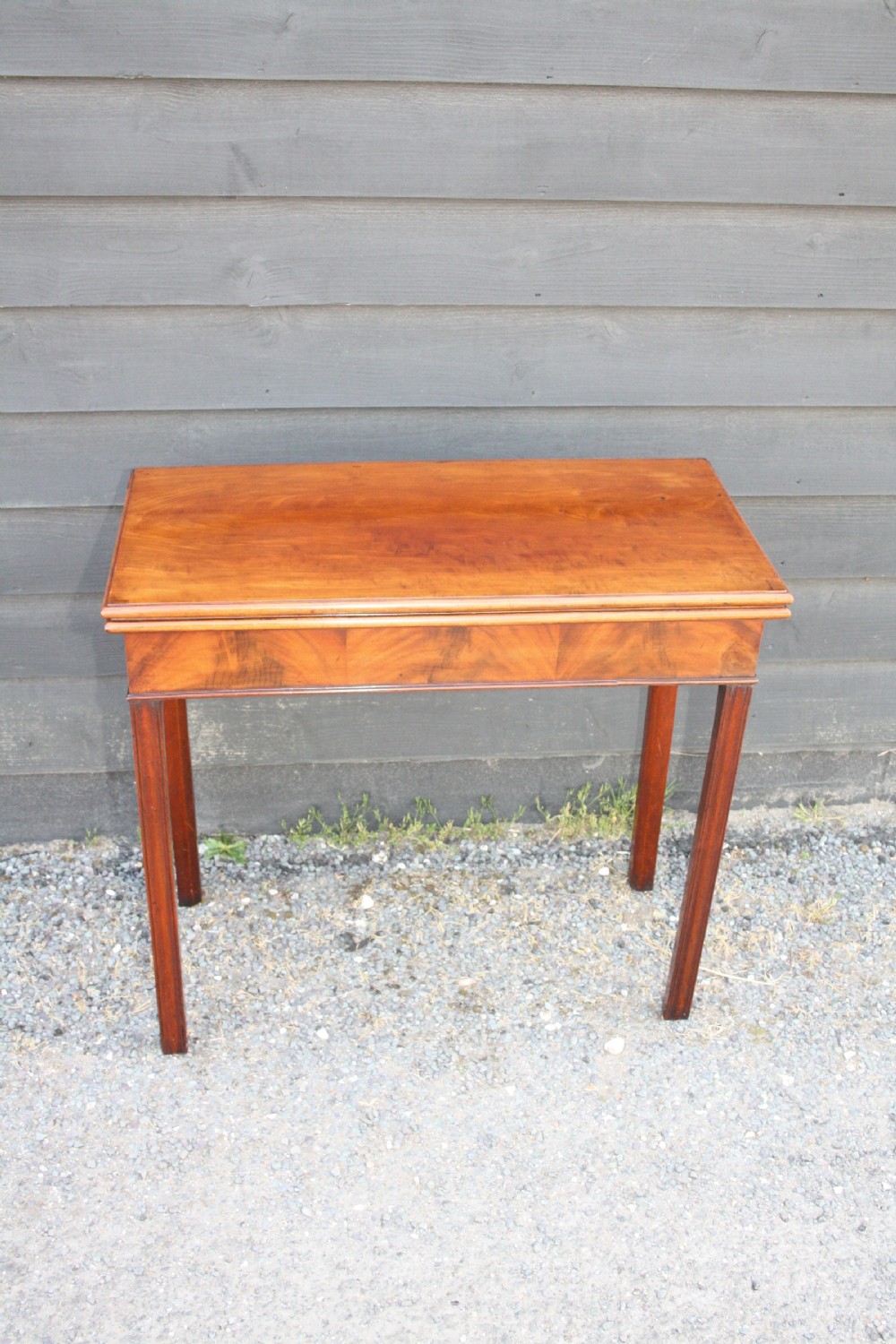 Georgian mahogany tea table With scissor action legs Mechanism.