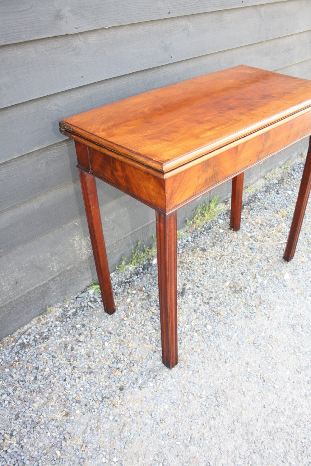 Georgian mahogany tea table With scissor action legs Mechanism. View V