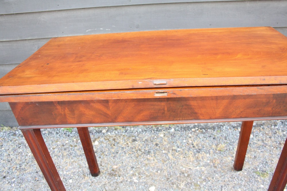 Georgian mahogany tea table With scissor action legs Mechanism. View VI