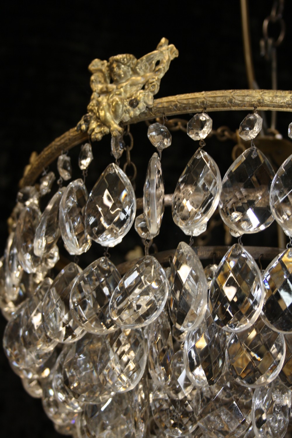 Early 20th century large drip chandelier with cherubs View IV