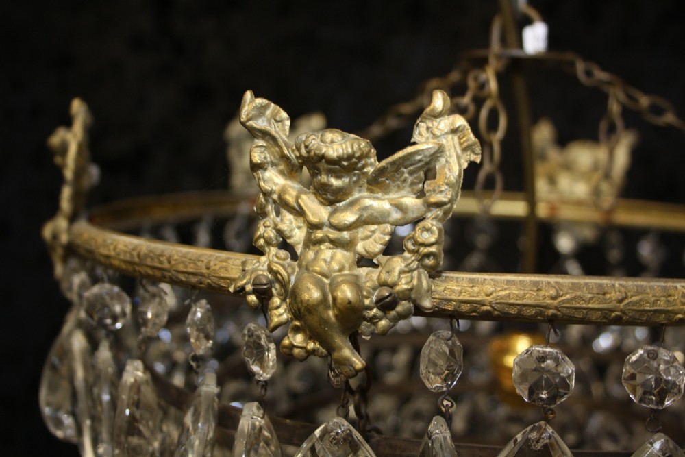 Early 20th century large drip chandelier with cherubs View V