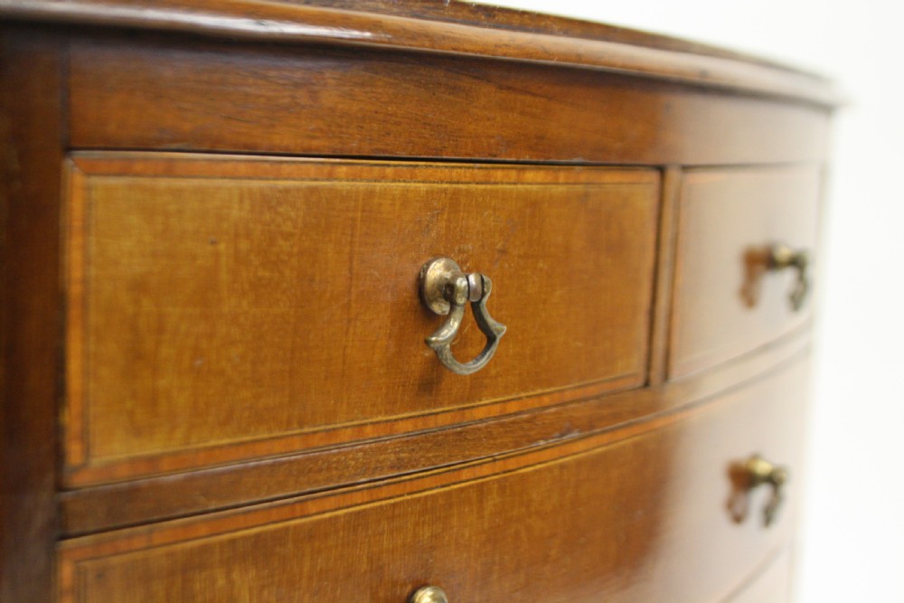 Late 19th century bow front miniature chest of drawers View X