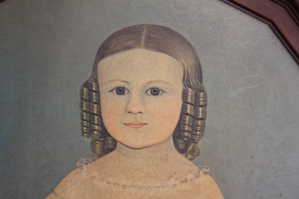Pair of early 20th century primitive portraits oil on board View XI
