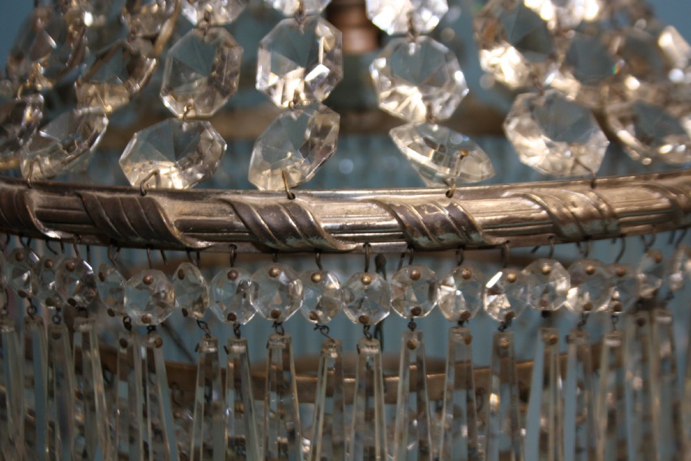 Large chandelier with Swags to the top and four layers of spikes View IV