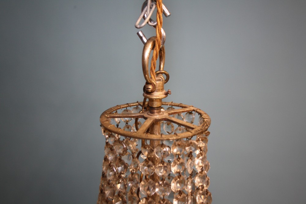 Large chandelier with Swags to the top and four layers of spikes View V