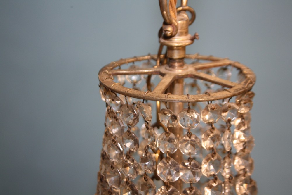 Large chandelier with Swags to the top and four layers of spikes View VI