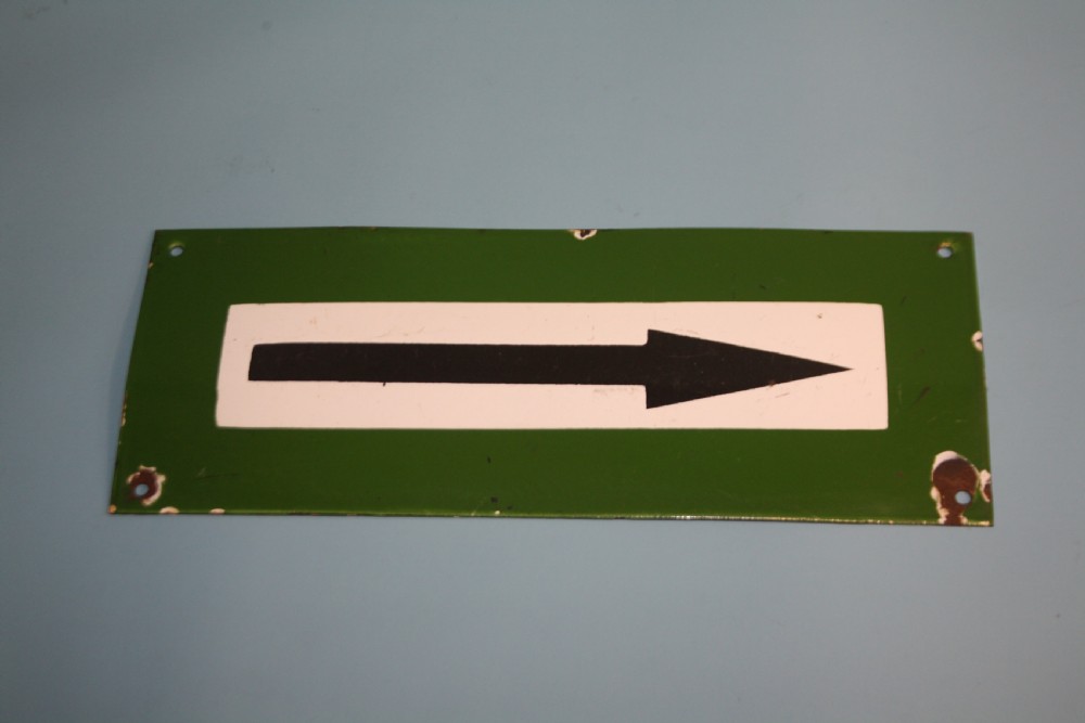Early 20th century enamel sign of an arrow