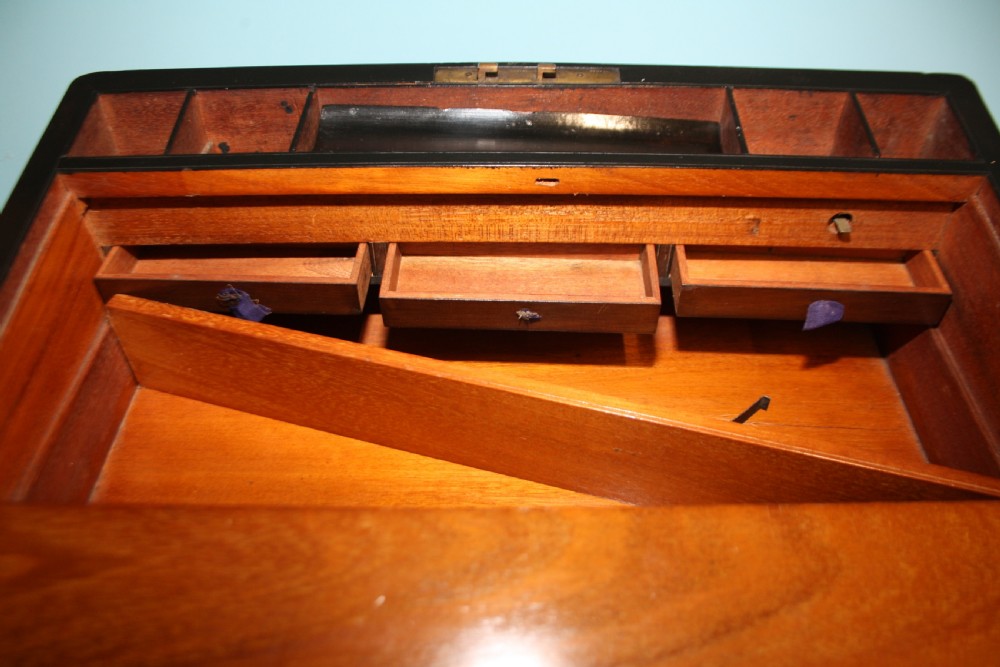 19th-century coromandel writing slope bound in brass with secret drawers View IX