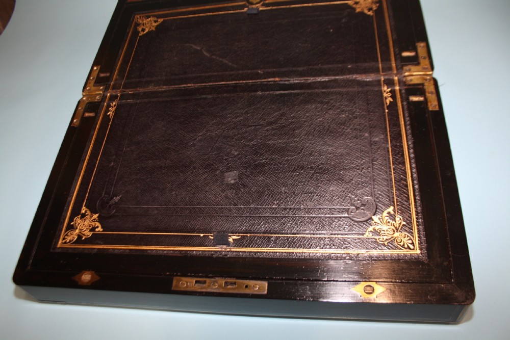 19th-century coromandel writing slope bound in brass with secret drawers View XI