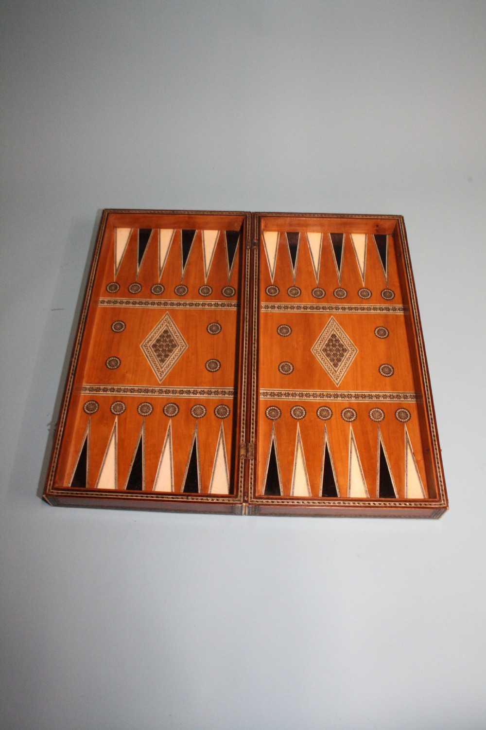 19th century chess board in bone and ebony, with backgammon to the inside. View II