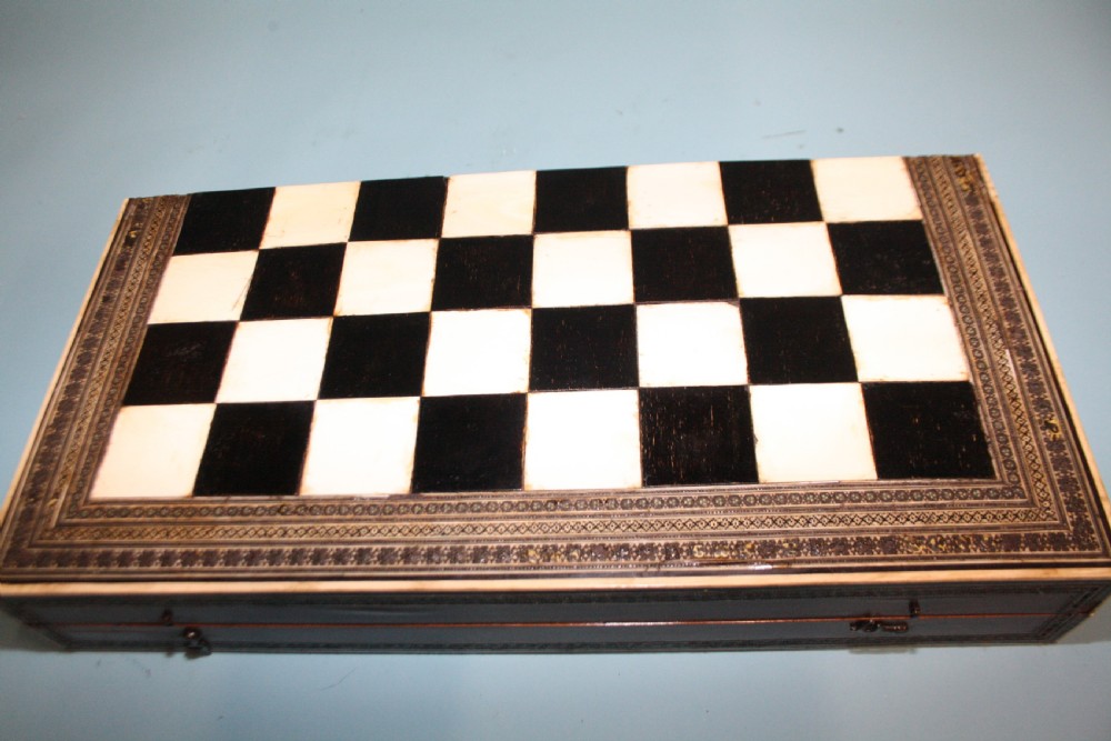 19th century chess board in bone and ebony, with backgammon to the inside. View XIV