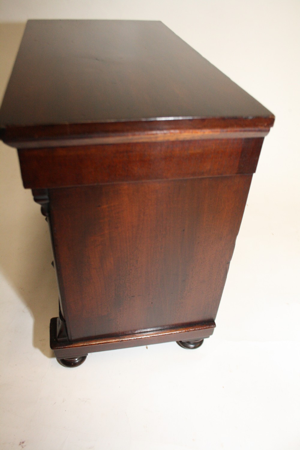 Late 19th century miniature chest of drawers with split bolsters View V