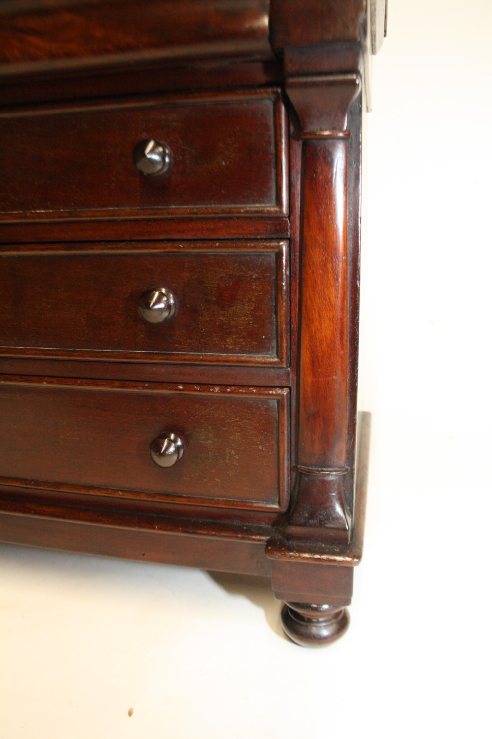 Late 19th century miniature chest of drawers with split bolsters View VI