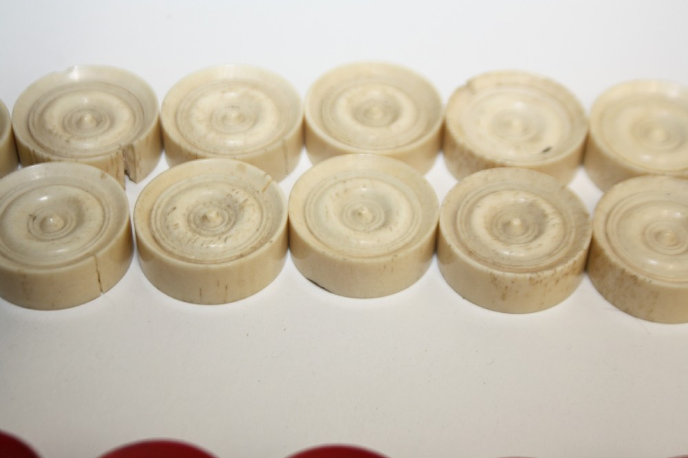 Late 19th century bone drafts set View IV