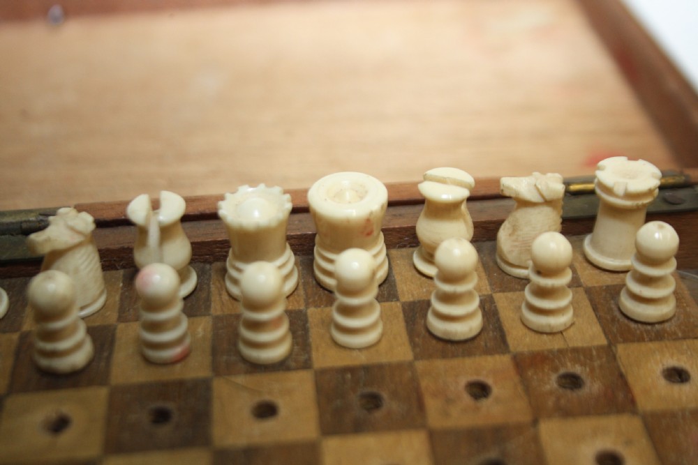 Early 20th century miniature travelling chess set View IV