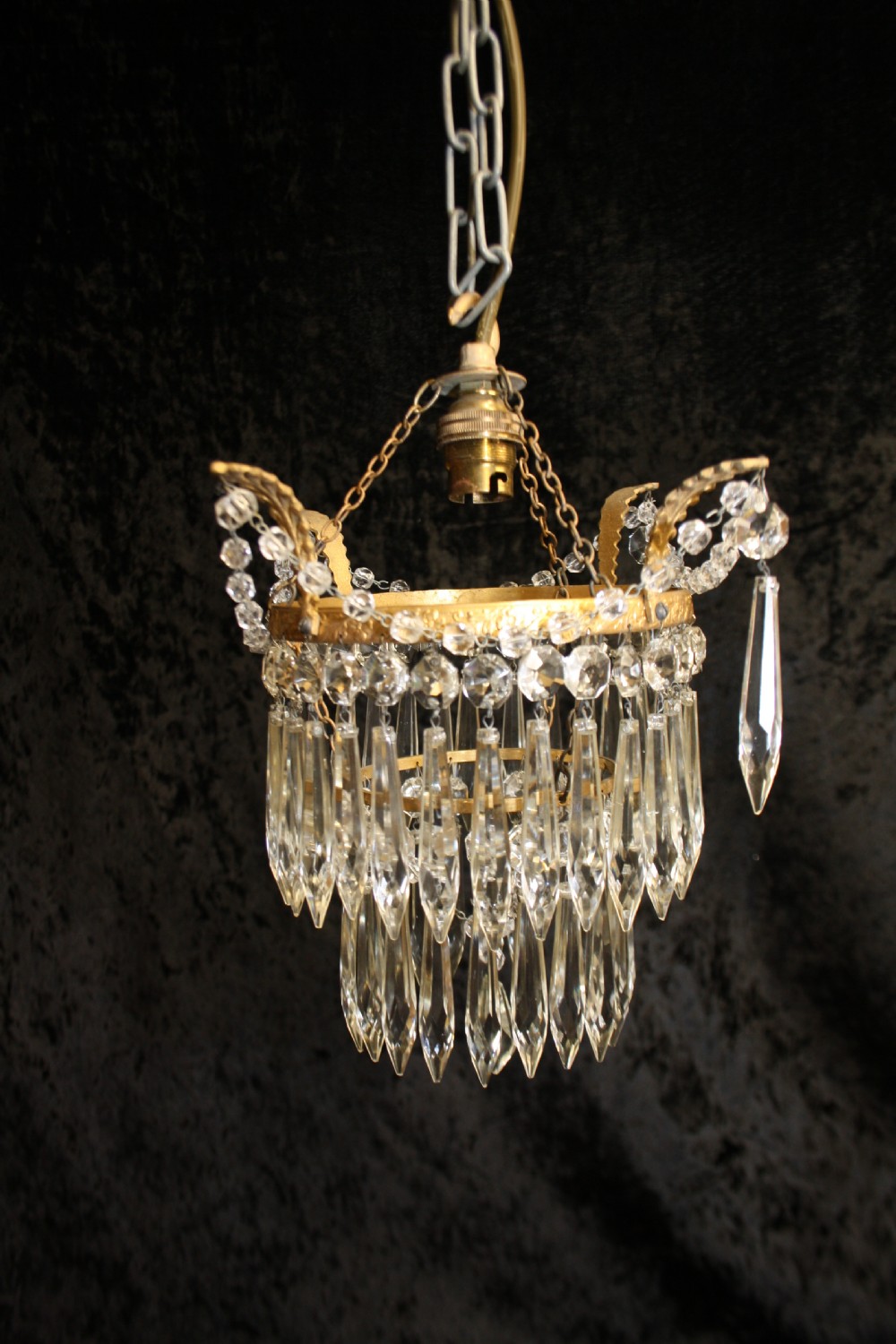 Pair of spike chandeliers with leaves and swags to the top View II