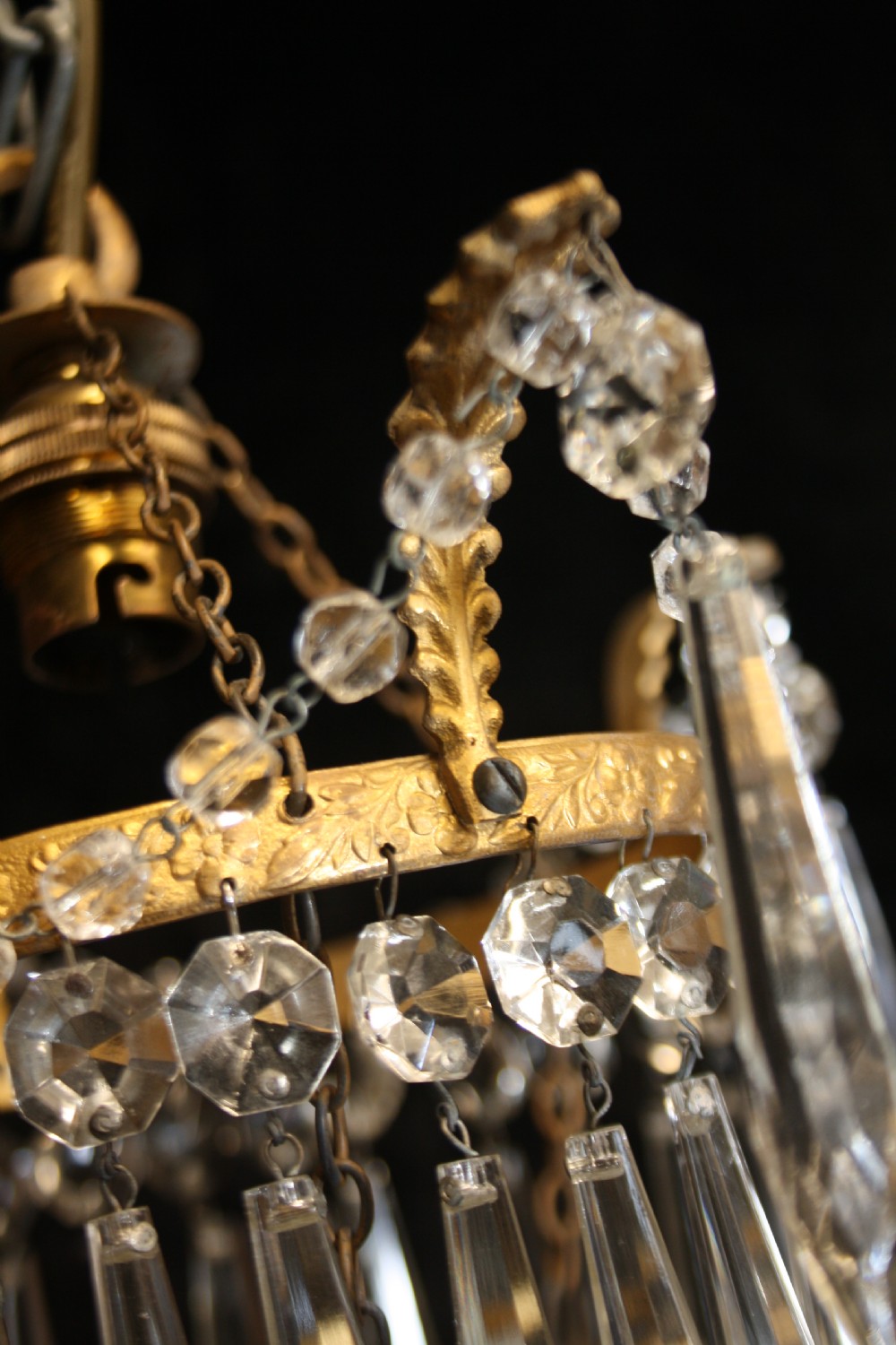 Pair of spike chandeliers with leaves and swags to the top View V
