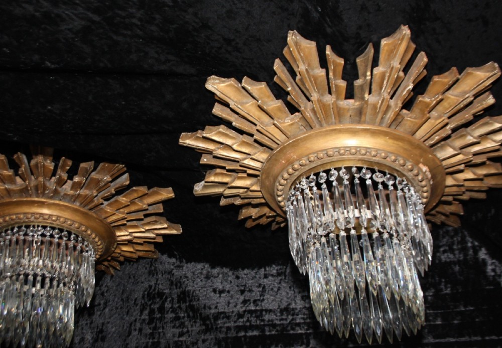 Early 20th century Pair of sun wooden gilt spike chandeliers