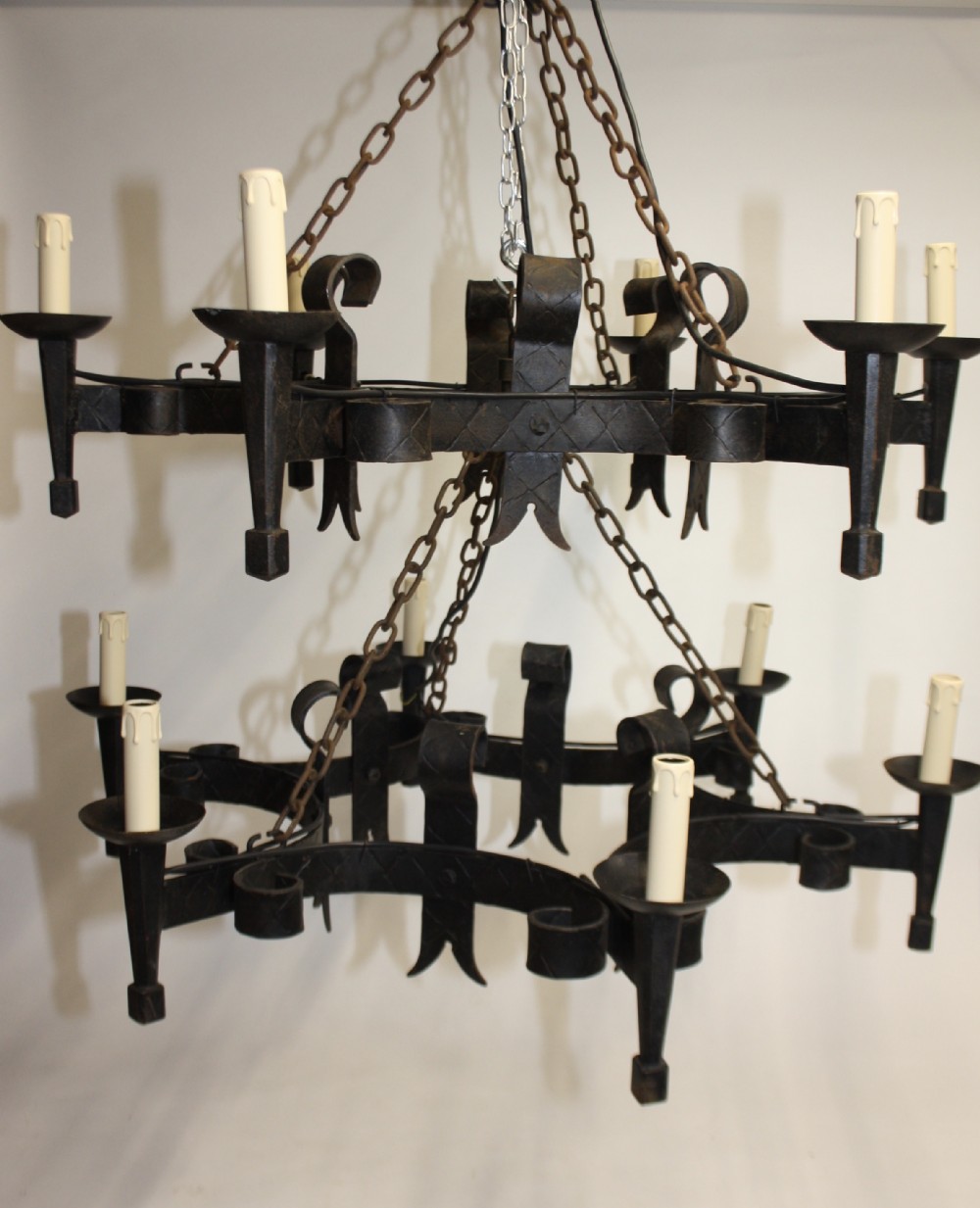 Pair of metal rustic chandeliers