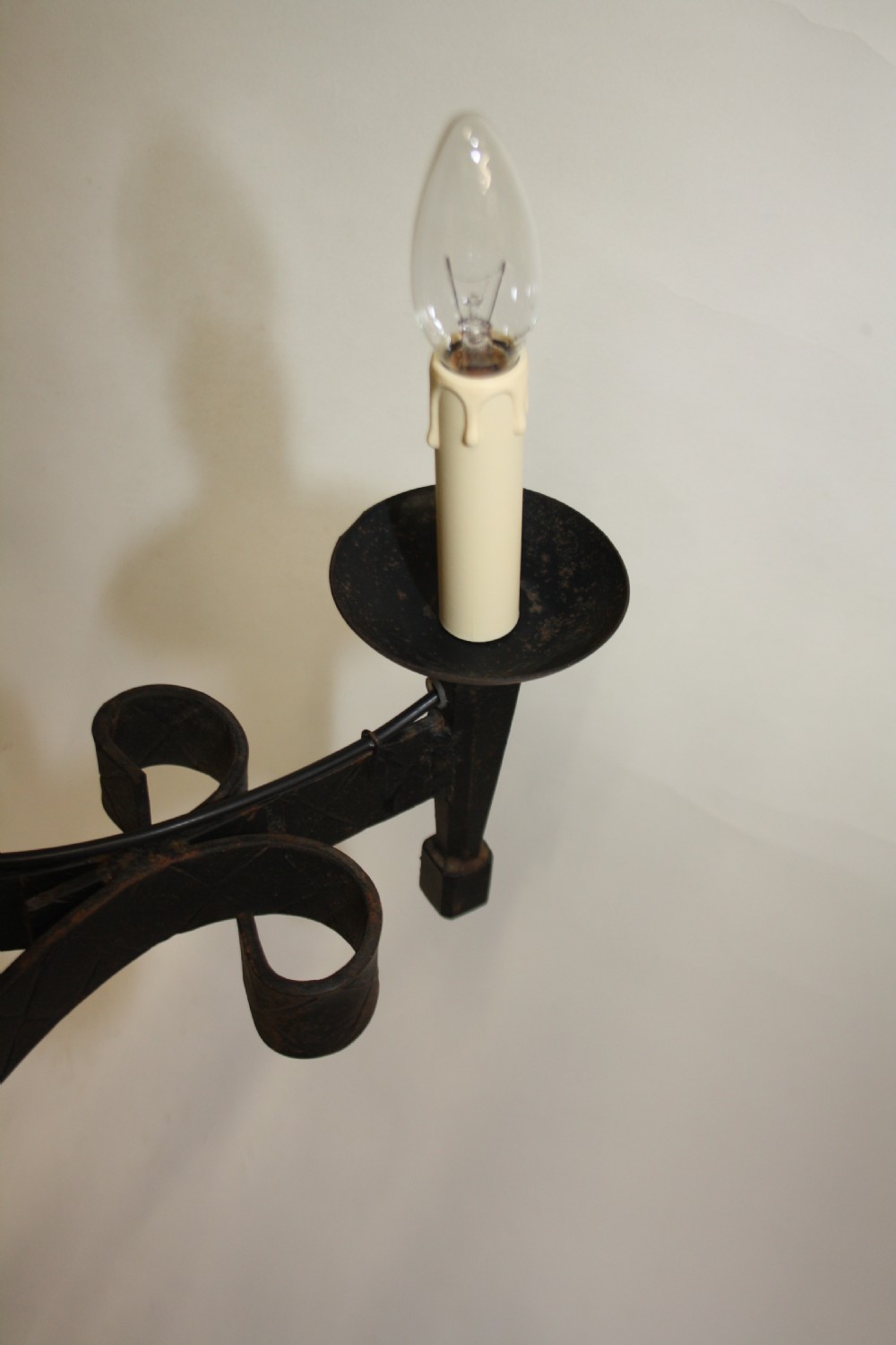 Pair of metal rustic chandeliers View X