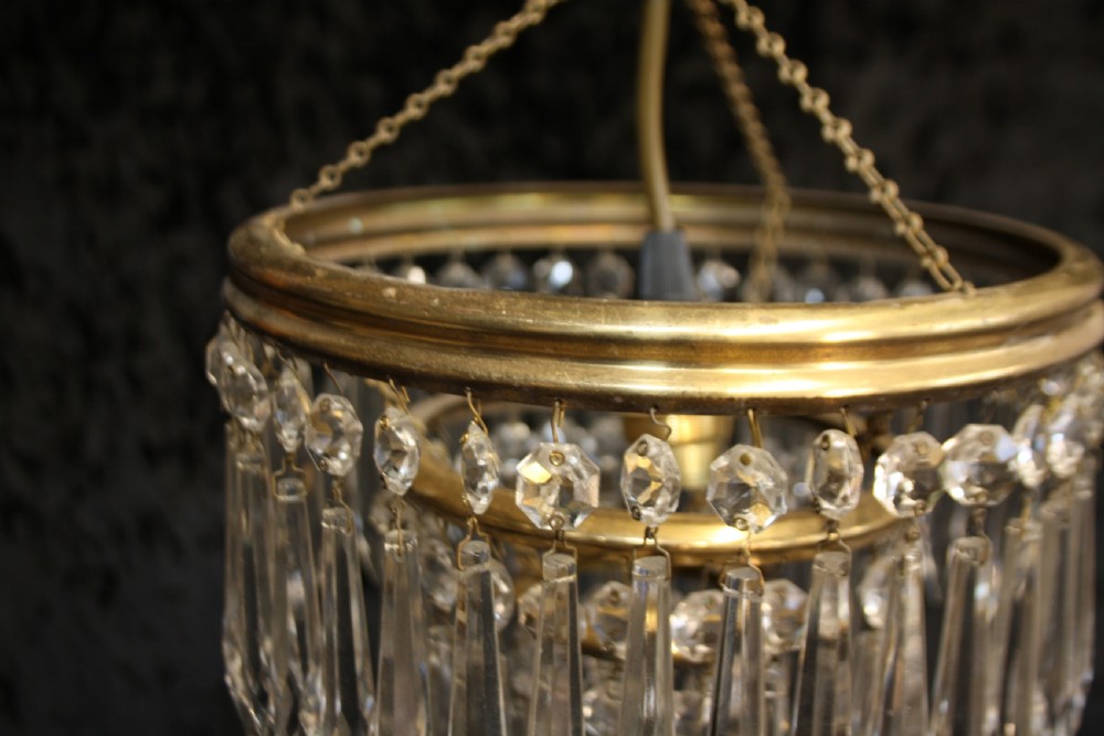 Spike chandelier with moulded brass rings View V