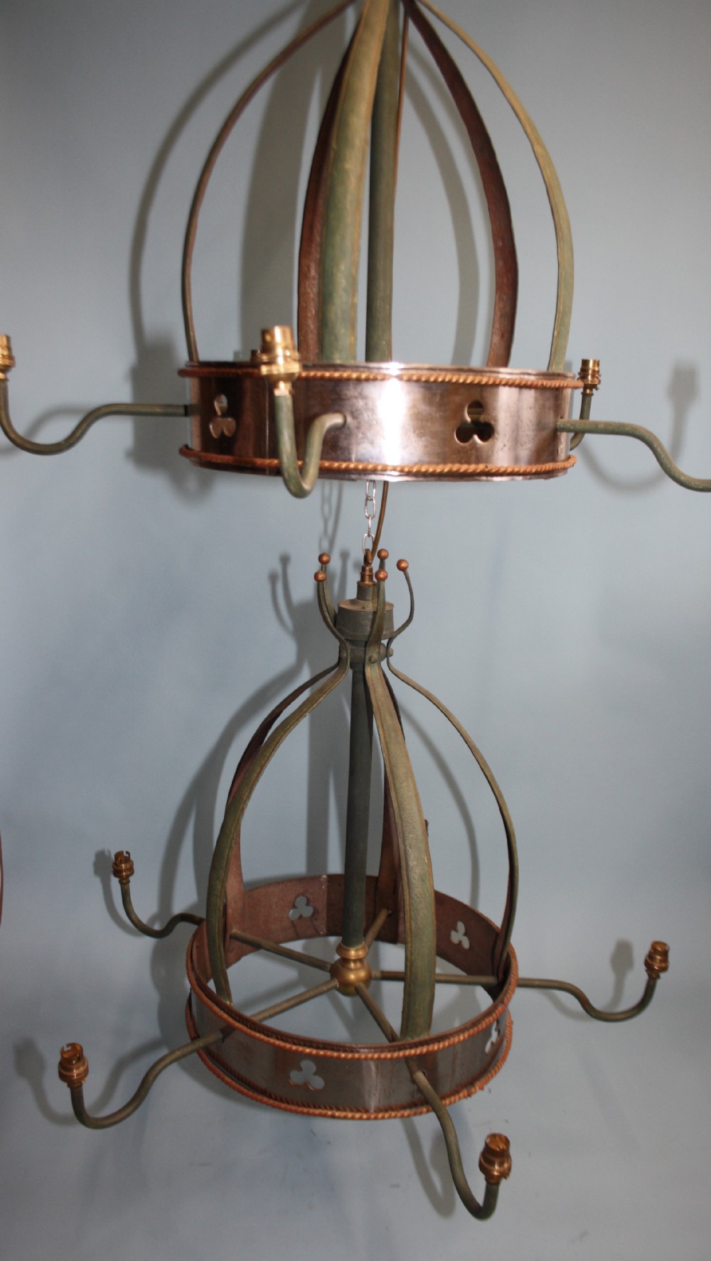 Early 20th century Pair of large polished steel chandeliers 