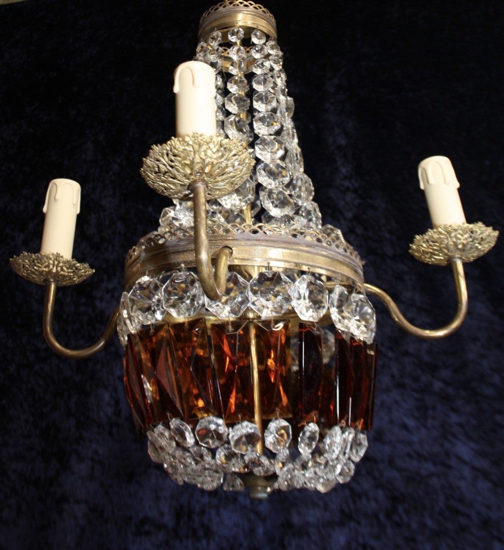 Early 20th century French chandelier with ruby coloured prisms View III