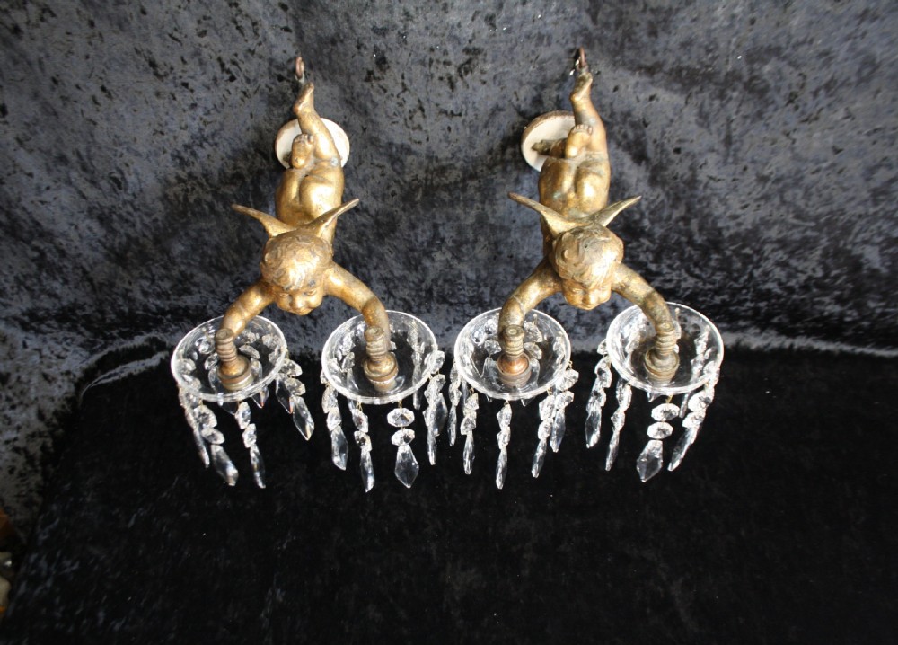 
Early 20th century pair of cherub wall lights View II