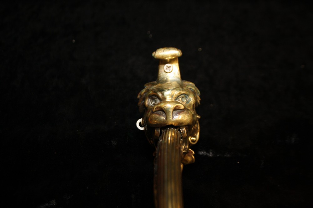 Pair of late 19th century lion and spike wall lights  View III