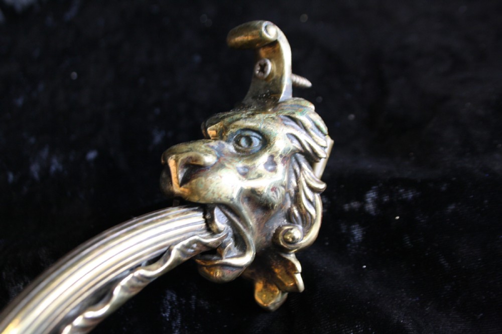 Pair of late 19th century lion and spike wall lights  View VI
