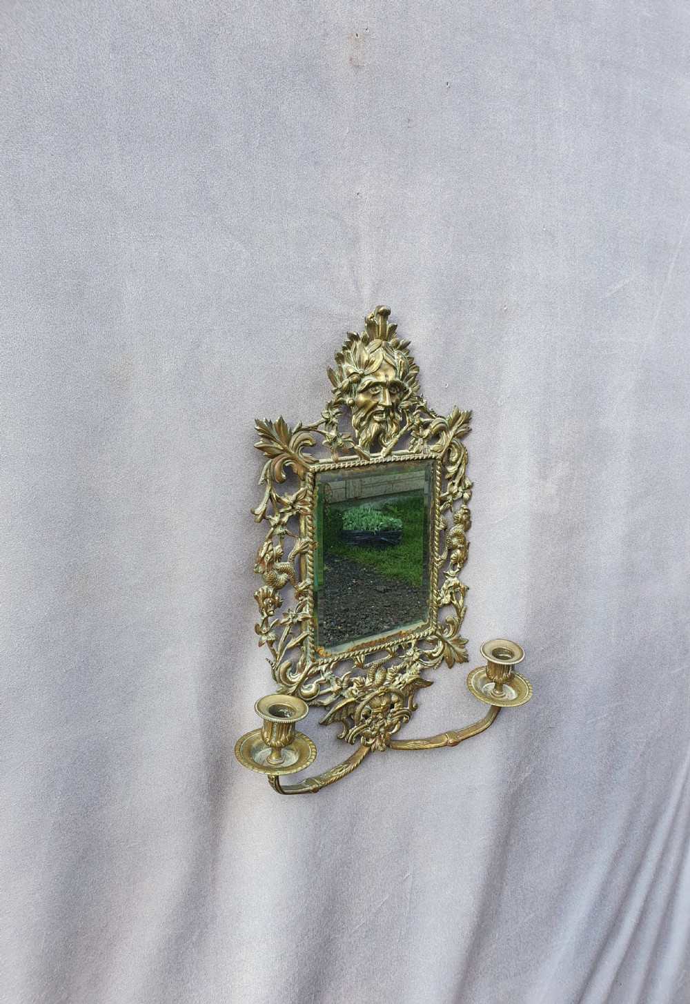 Brass mirror with old man Thames 