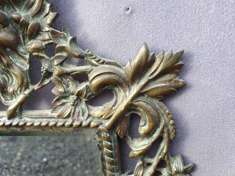 Brass mirror with old man Thames  View III