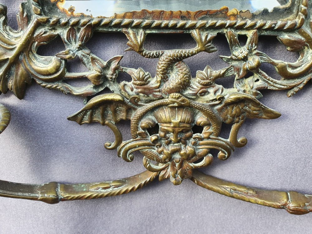 Brass mirror with old man Thames  View V