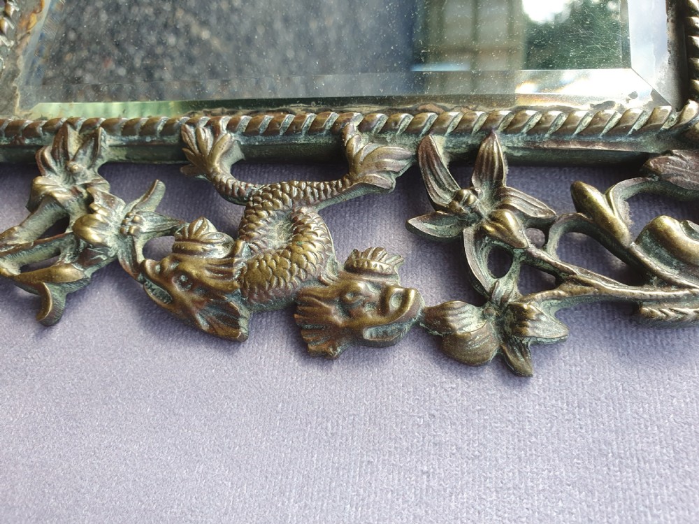 Brass mirror with old man Thames  View VII
