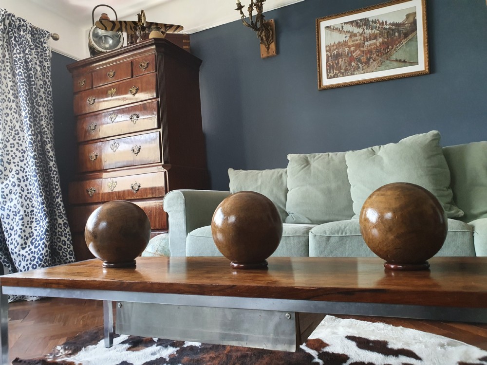 Three lignum vitae balls 8.5