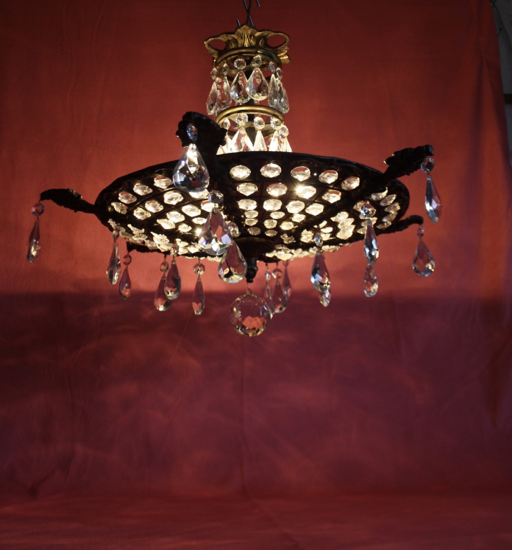 Brass chandelier with pierced brass base View II