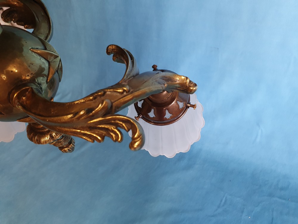 Early 20th century brass ceiling light with glass shades View V