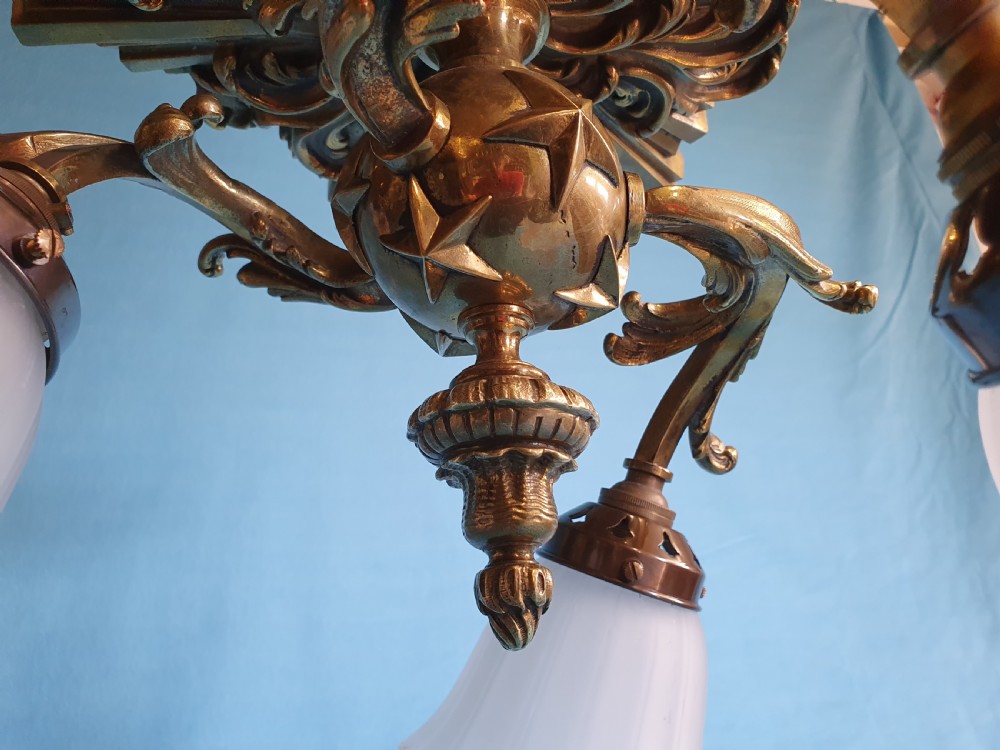 Early 20th century brass ceiling light with glass shades View IX