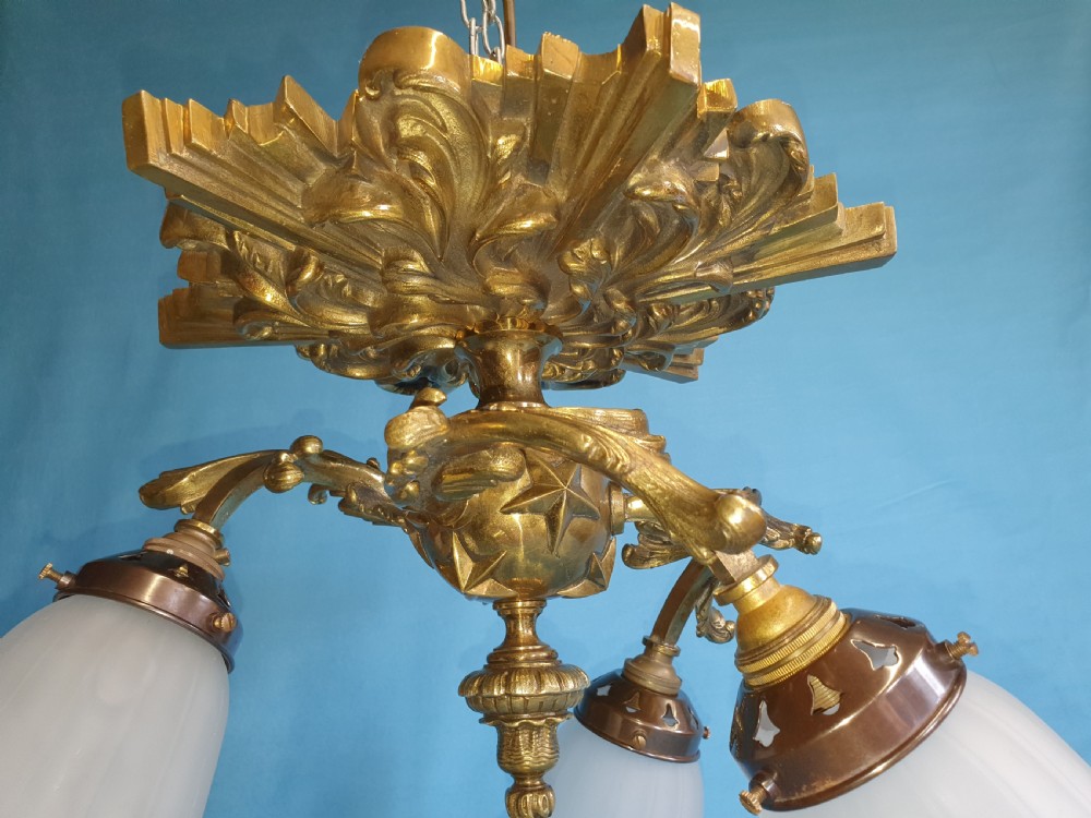 Early 20th century brass ceiling light with glass shades View III