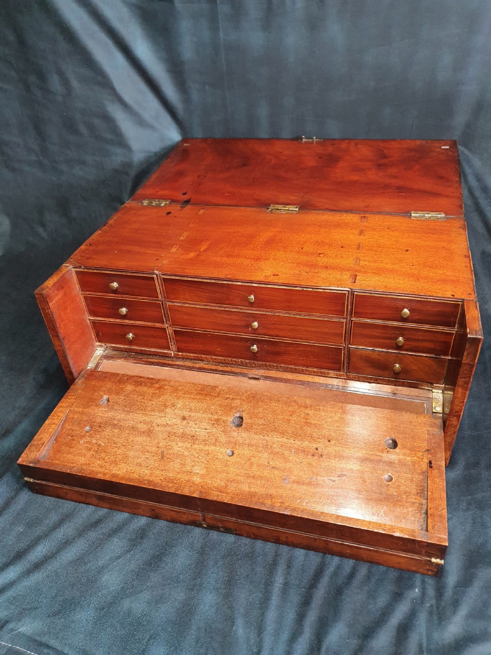 George III writing slope, unusual form and secret drawers View III