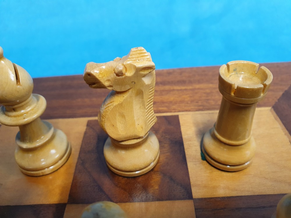 Early 20th century chess board made by Jacks of London with chess set View X